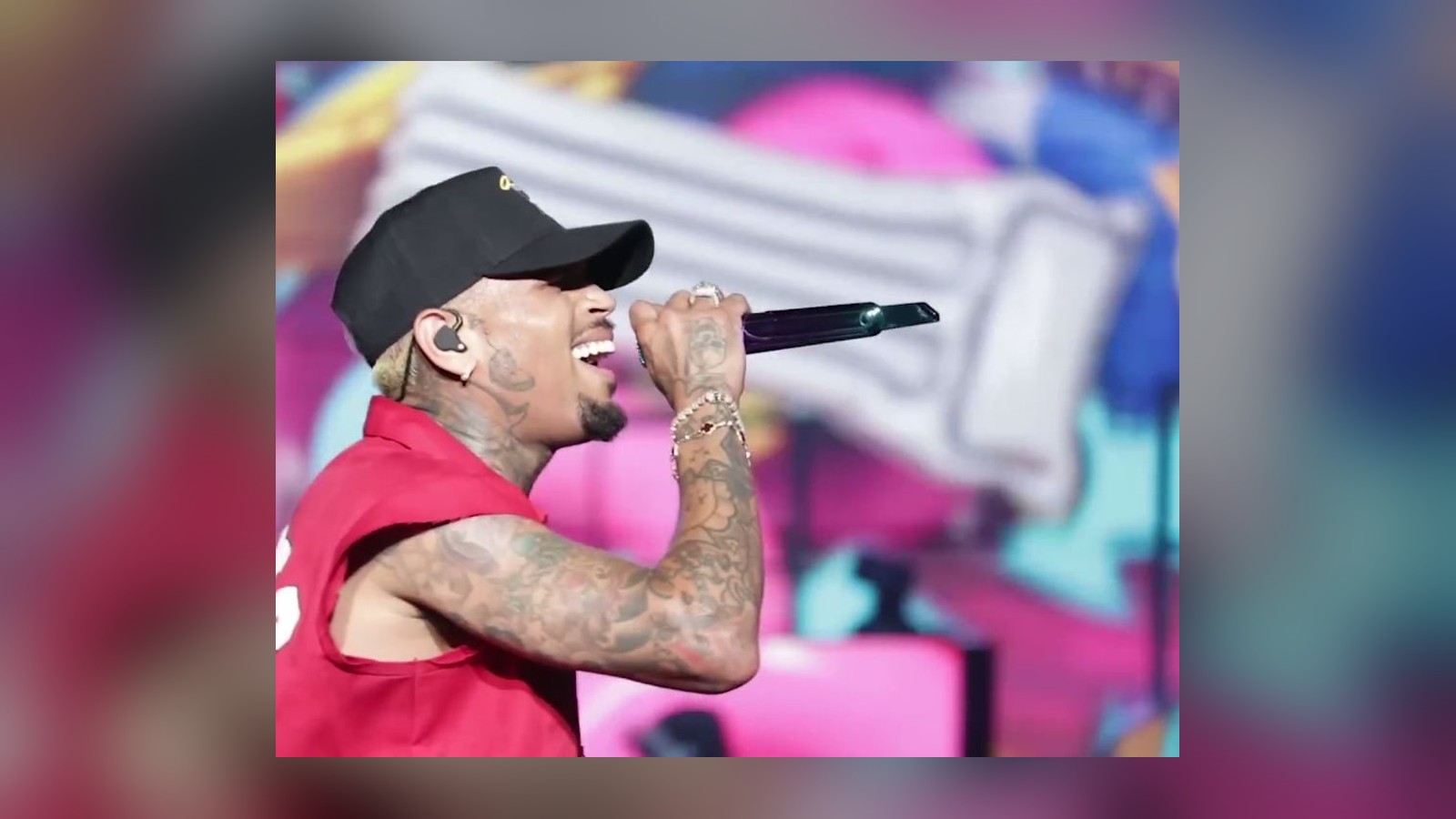 Chris Brown Fires Back at Critic Who Called Him an 'Idiot' Over Bottle Case: 'Don't Be Next'